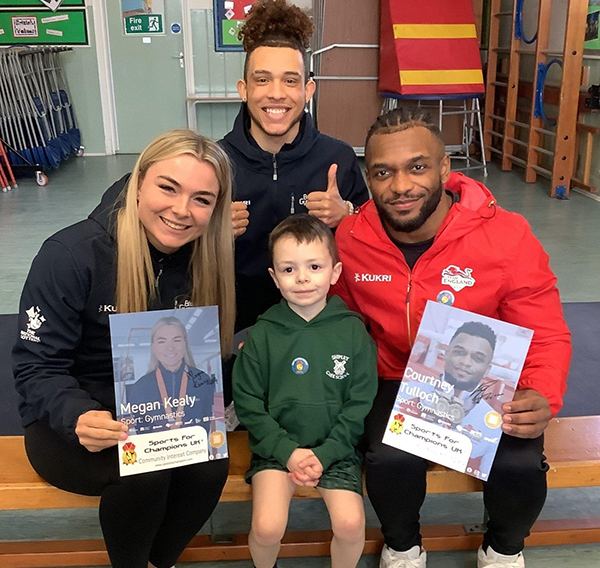 Megan, Marni and Coutney pictured with school pupil